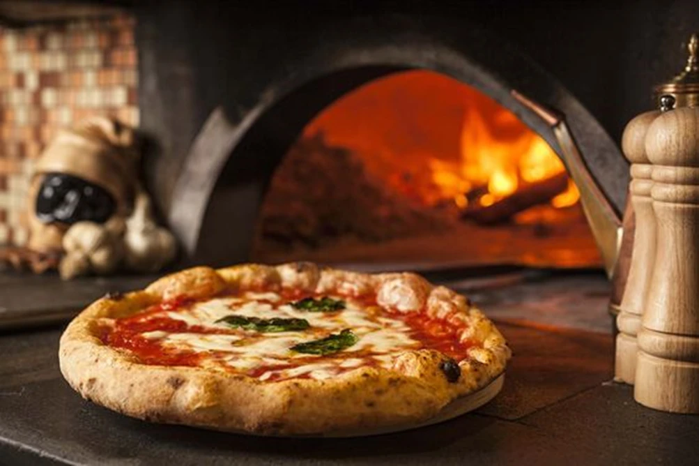 A Verdadeira História da Pizza e sua Evolução Técnica